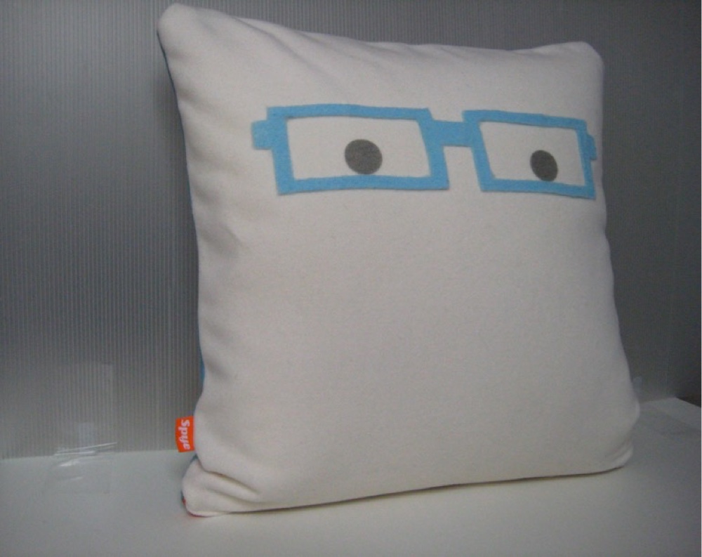 cashmere throw pillow with felt glasses